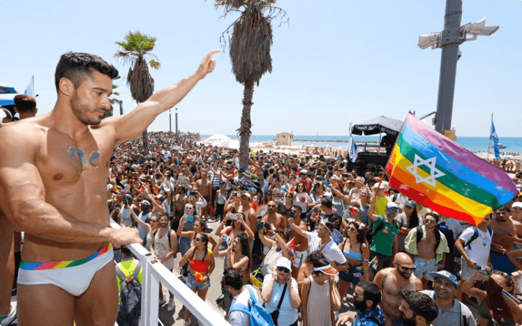 people celebrating on tel aviv pride paade